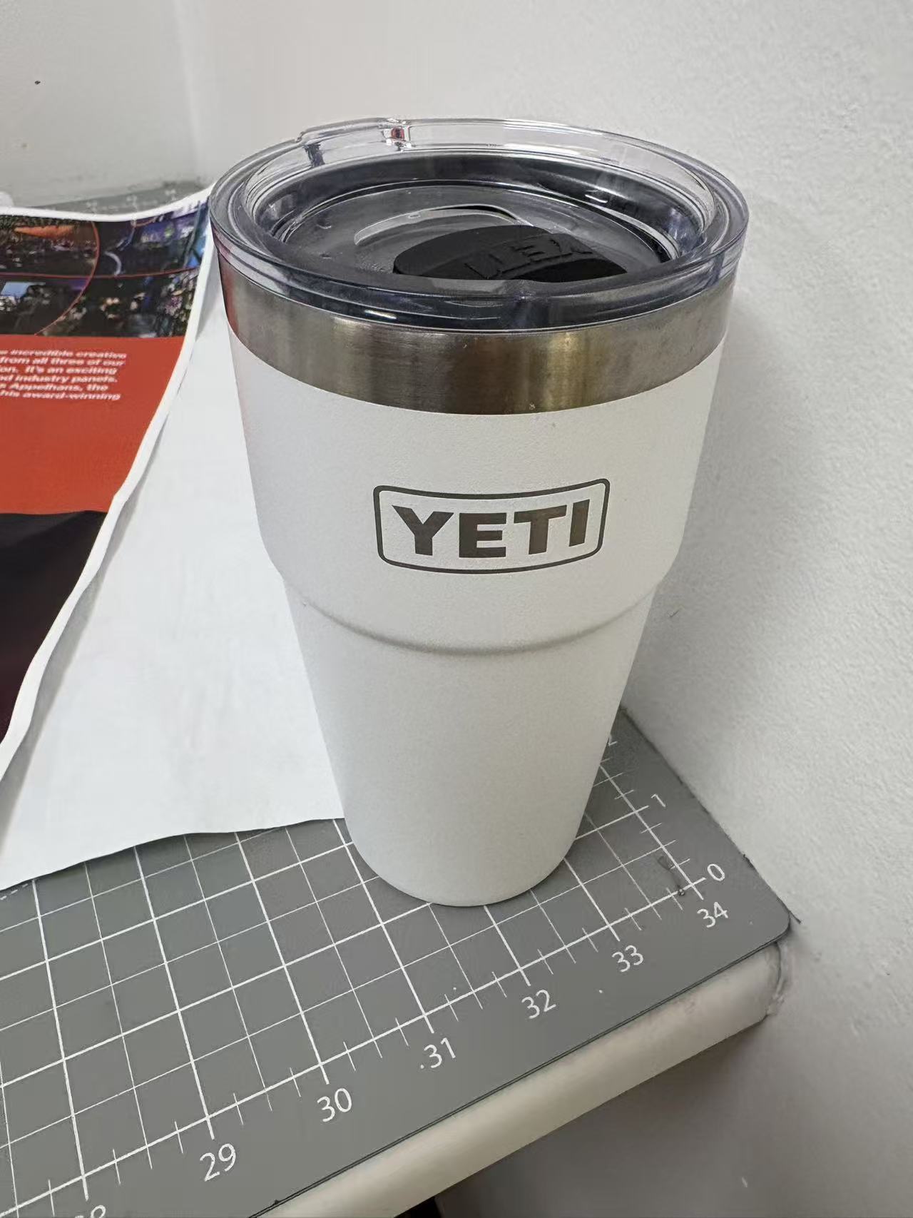 YETI thermos, white spray-painted metal exterior