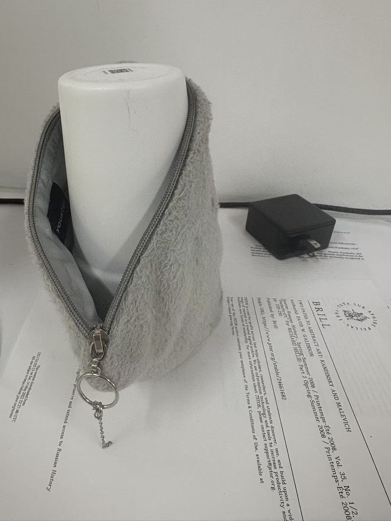 Thermos and plush bag still in place on Day 5, tissues removed