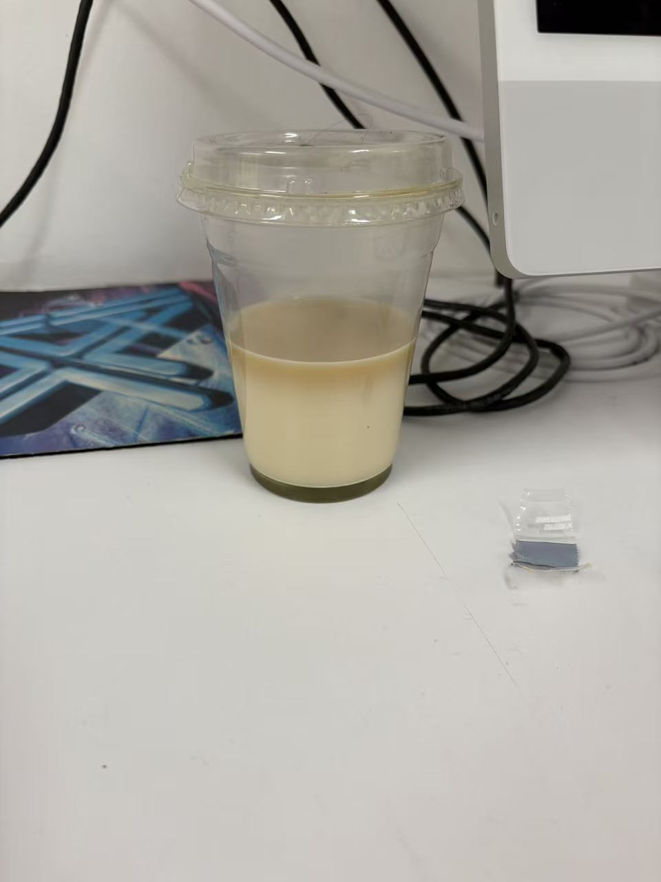 Milk tea cup, third dark layer now visible on top