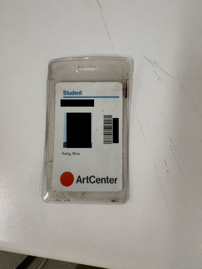 Student ID card on desk, viewed from a distance